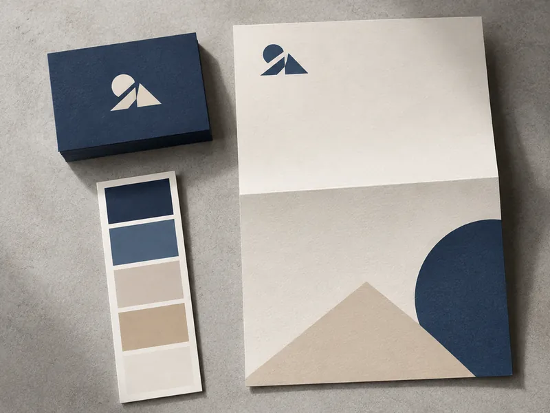 Brand identity kit with logo cards, a palette strip, and a letterhead